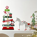 A small wooden Christmas tree with holiday decorations, Santa Claus, and gift designs, made of wood for holiday decorations