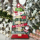 A small wooden Christmas tree with holiday decorations, Santa Claus, and gift designs, made of wood for holiday decorations